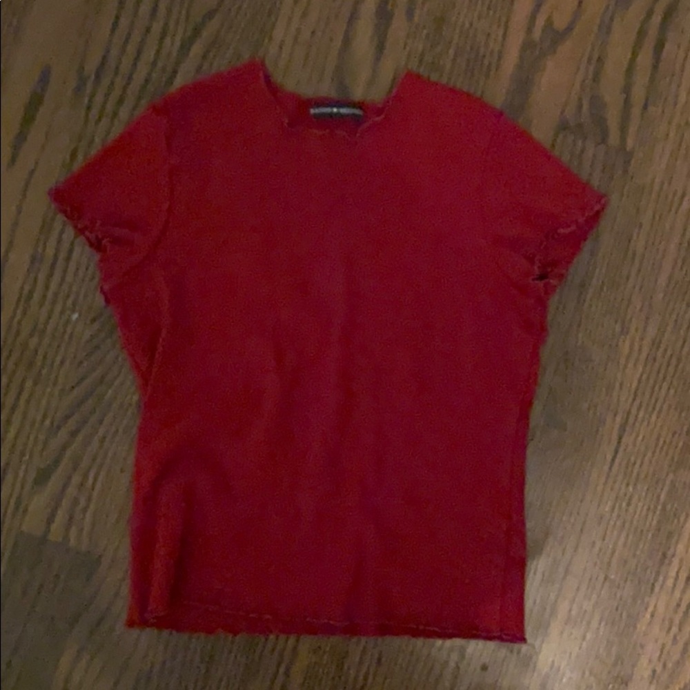 A ruffled at the sleeve short sleeve shirt